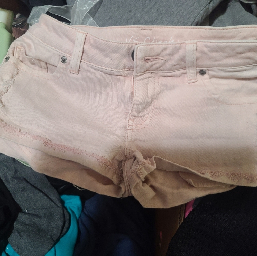 Light Pink Distressed Denim Shorts